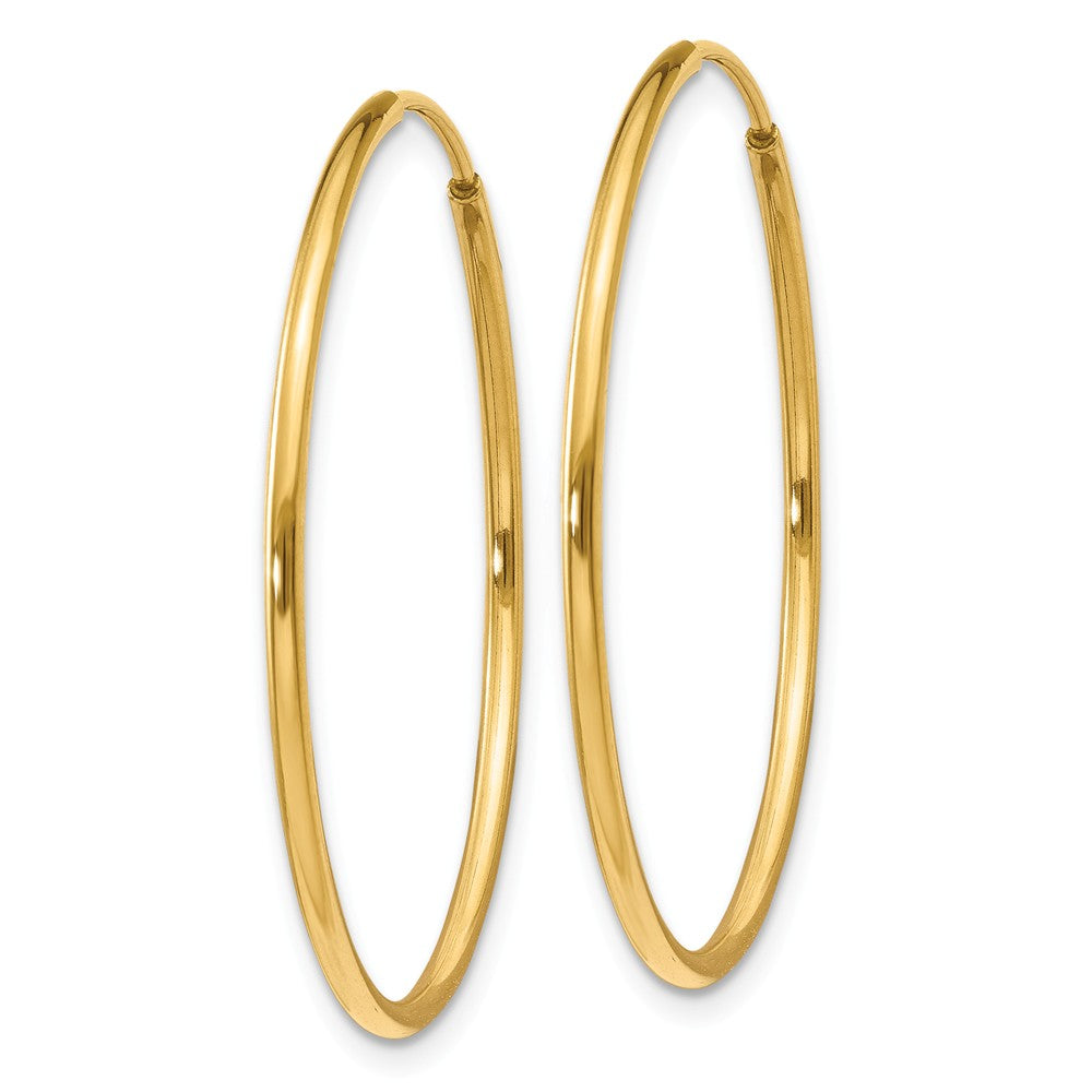 Alternate view of the 1.25mm, 14k Yellow Gold Endless Hoop Earrings, 28mm (1 1/10 Inch) by The Black Bow Jewelry Co.