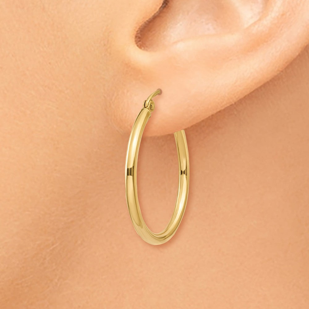 Alternate view of the 2mm, 14k Yellow Gold Classic Round Hoop Earrings, 25mm (1 Inch) by The Black Bow Jewelry Co.