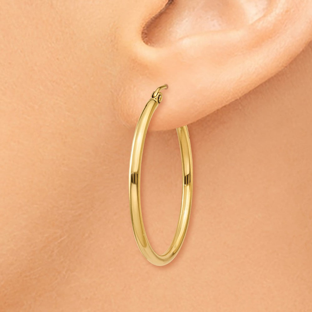 Alternate view of the 2mm, 14k Yellow Gold Classic Round Hoop Earrings, 30mm (1 1/8 Inch) by The Black Bow Jewelry Co.