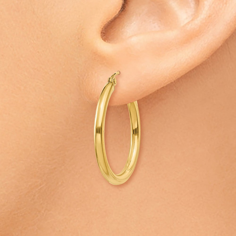 Alternate view of the 2.5mm, 14k Yellow Gold Classic Round Hoop Earrings, 25mm (1 Inch) by The Black Bow Jewelry Co.