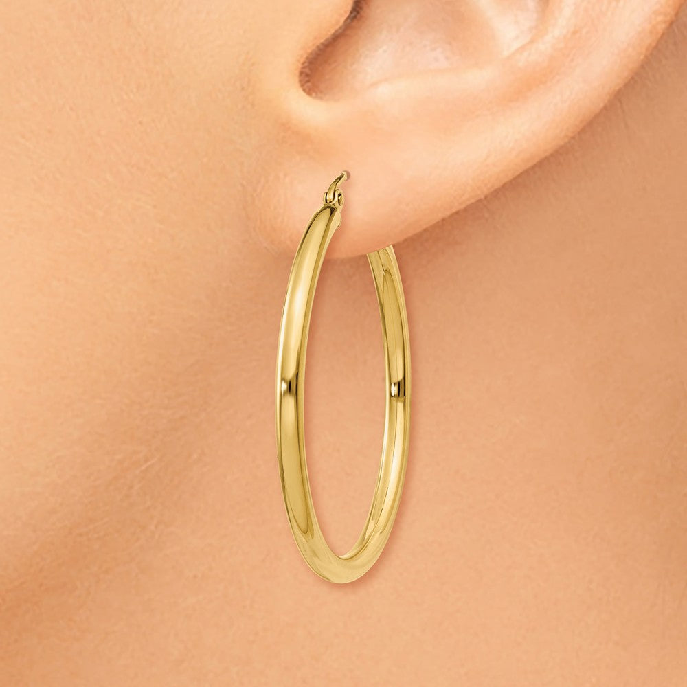 Alternate view of the 2.5mm, 14k Yellow Gold Classic Round Hoop Earrings, 35mm (1 3/8 Inch) by The Black Bow Jewelry Co.