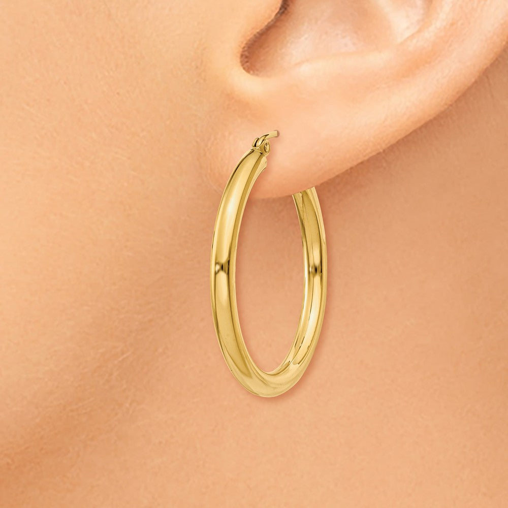 Alternate view of the 3mm, 14k Yellow Gold Classic Round Hoop Earrings, 30mm (1 1/8 Inch) by The Black Bow Jewelry Co.