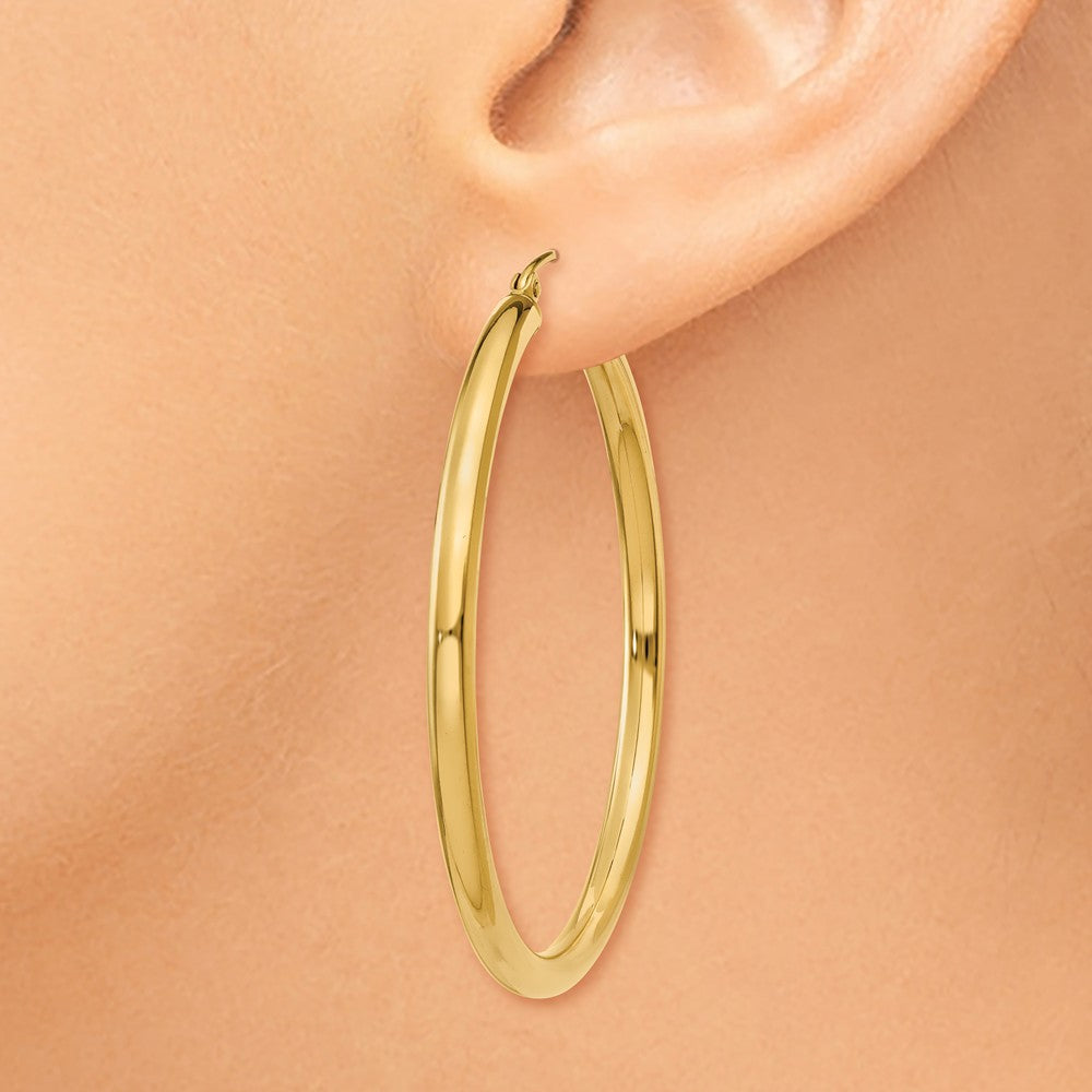 Alternate view of the 3mm, 14k Yellow Gold Classic Round Hoop Earrings, 45mm (1 3/4 Inch) by The Black Bow Jewelry Co.