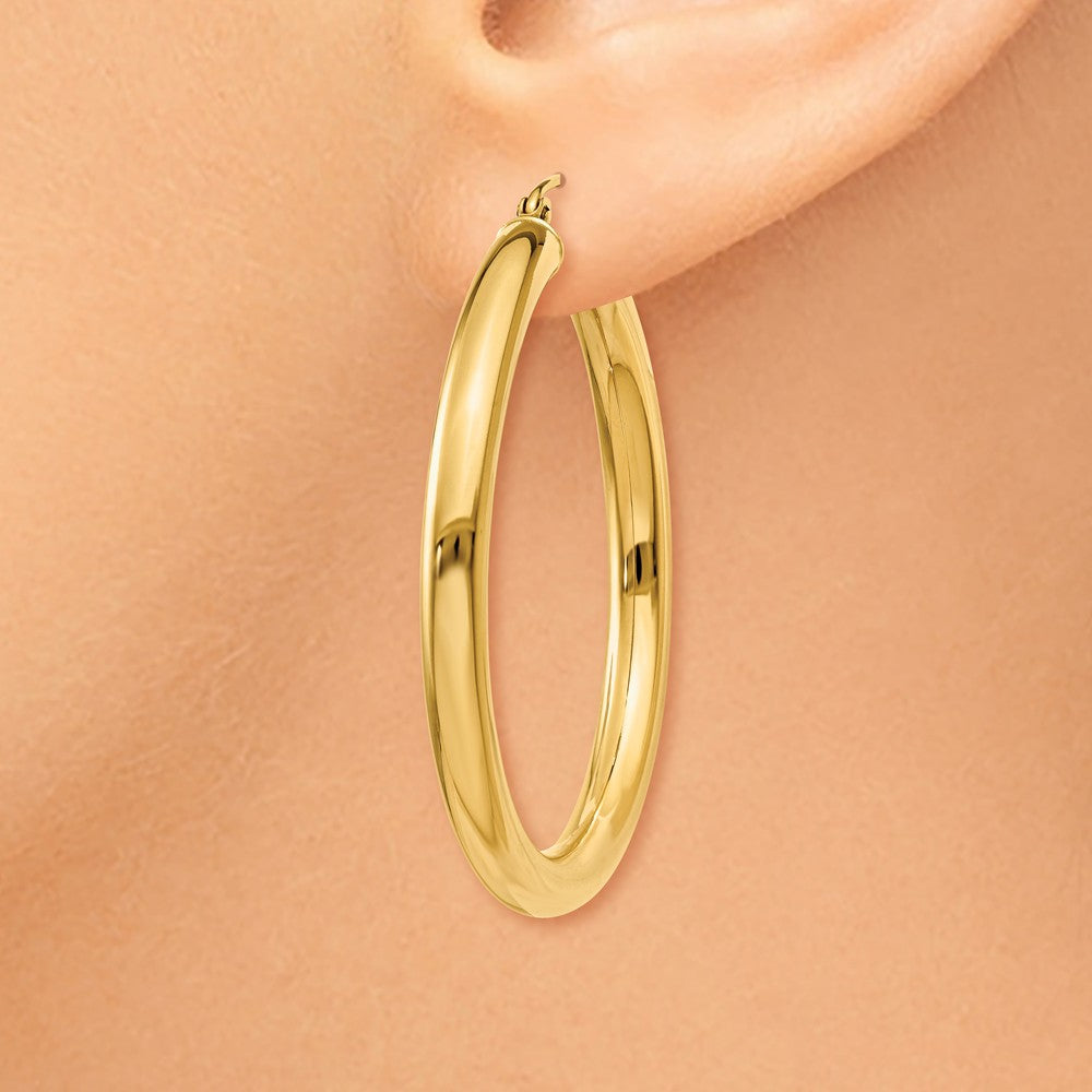 Alternate view of the 4mm, 14k Yellow Gold Classic Round Hoop Earrings, 40mm (1 1/2 Inch) by The Black Bow Jewelry Co.