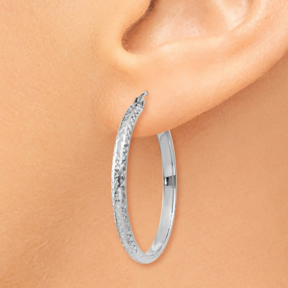 Alternate view of the 2.8mm, 14k White Gold Diamond-cut Hoops, 30mm (1 1/8 Inch) by The Black Bow Jewelry Co.