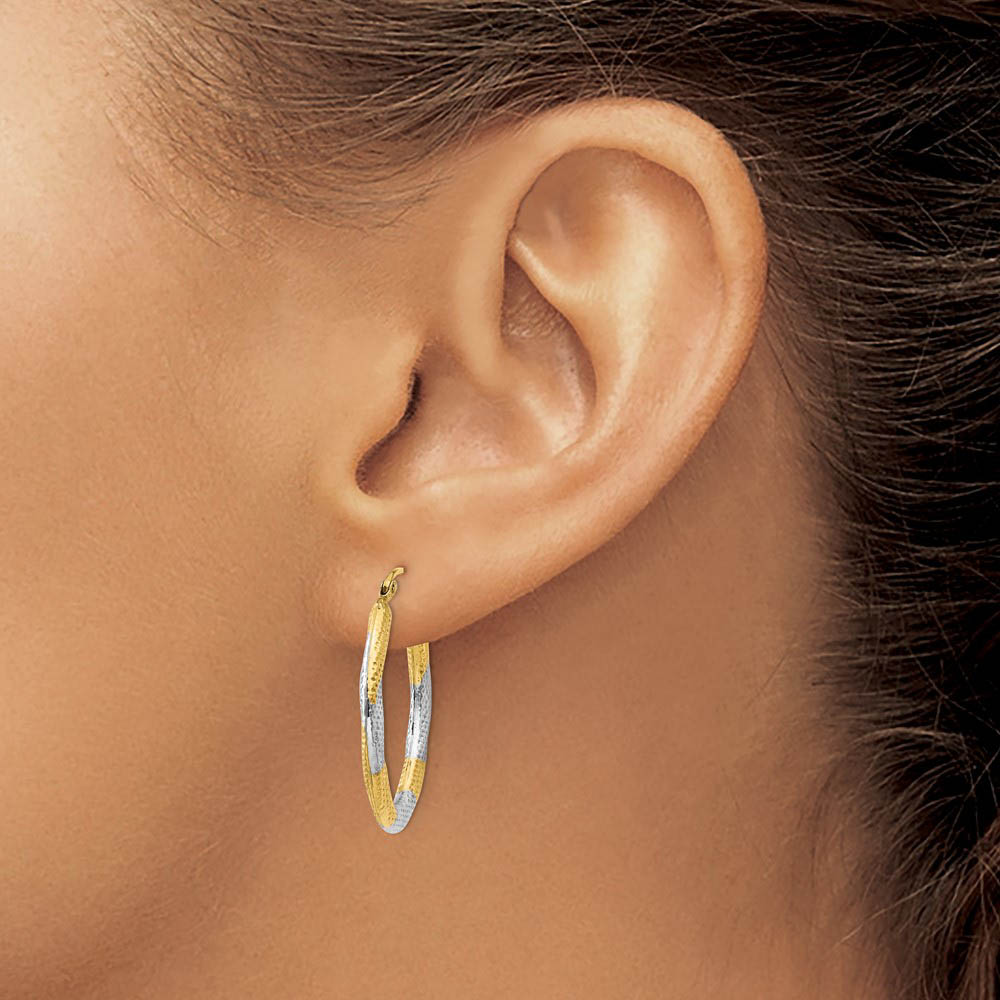 Alternate view of the Textured Hollow Oval Hoops in 14k Yellow Gold and Rhodium by The Black Bow Jewelry Co.