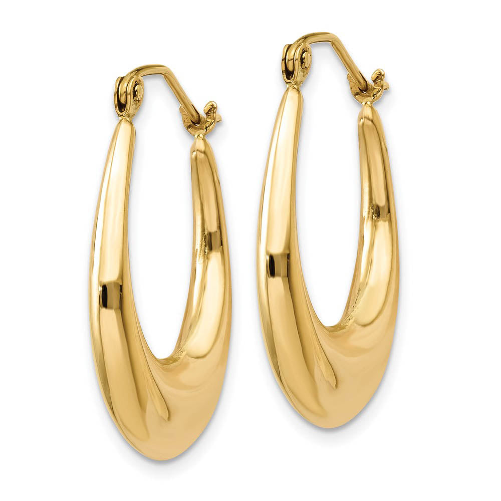 Alternate view of the Tapered Puffed Oval Hoop Earrings in 14k Yellow Gold by The Black Bow Jewelry Co.