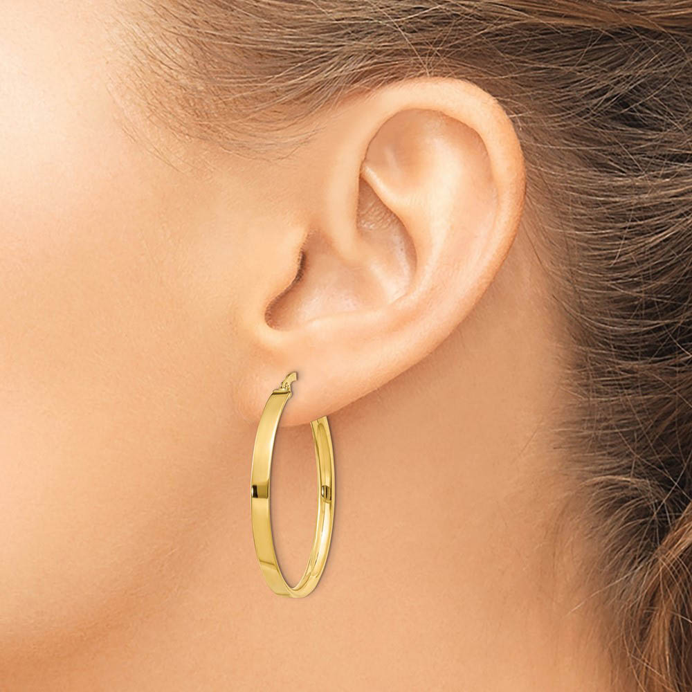 Alternate view of the 3mm, 14k Yellow Gold Polished Round Hoop Earrings, 35mm (1 3/8 Inch) by The Black Bow Jewelry Co.