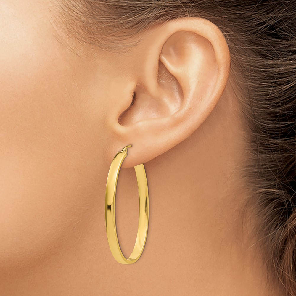 Alternate view of the 4mm, 14k Yellow Gold Large Oval Hoop Earrings, 45mm (1 3/4 Inch) by The Black Bow Jewelry Co.
