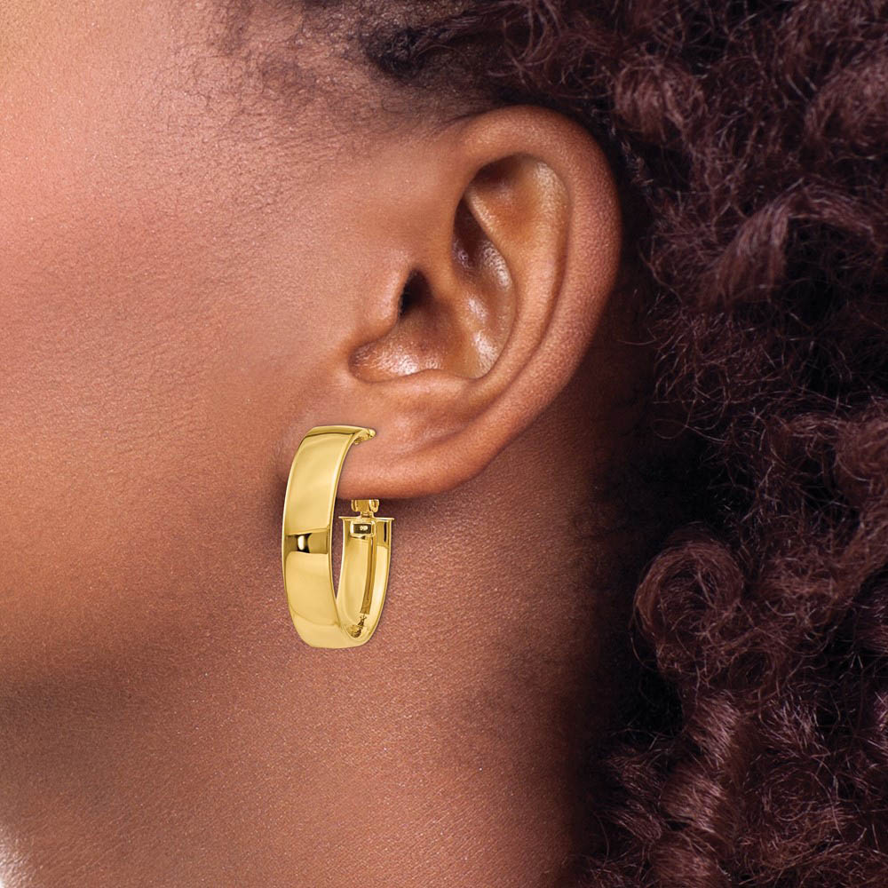Alternate view of the 6.75mm, 14k Yellow Gold Omega Back Oval Hoop Earrings, 25mm (1 Inch) by The Black Bow Jewelry Co.