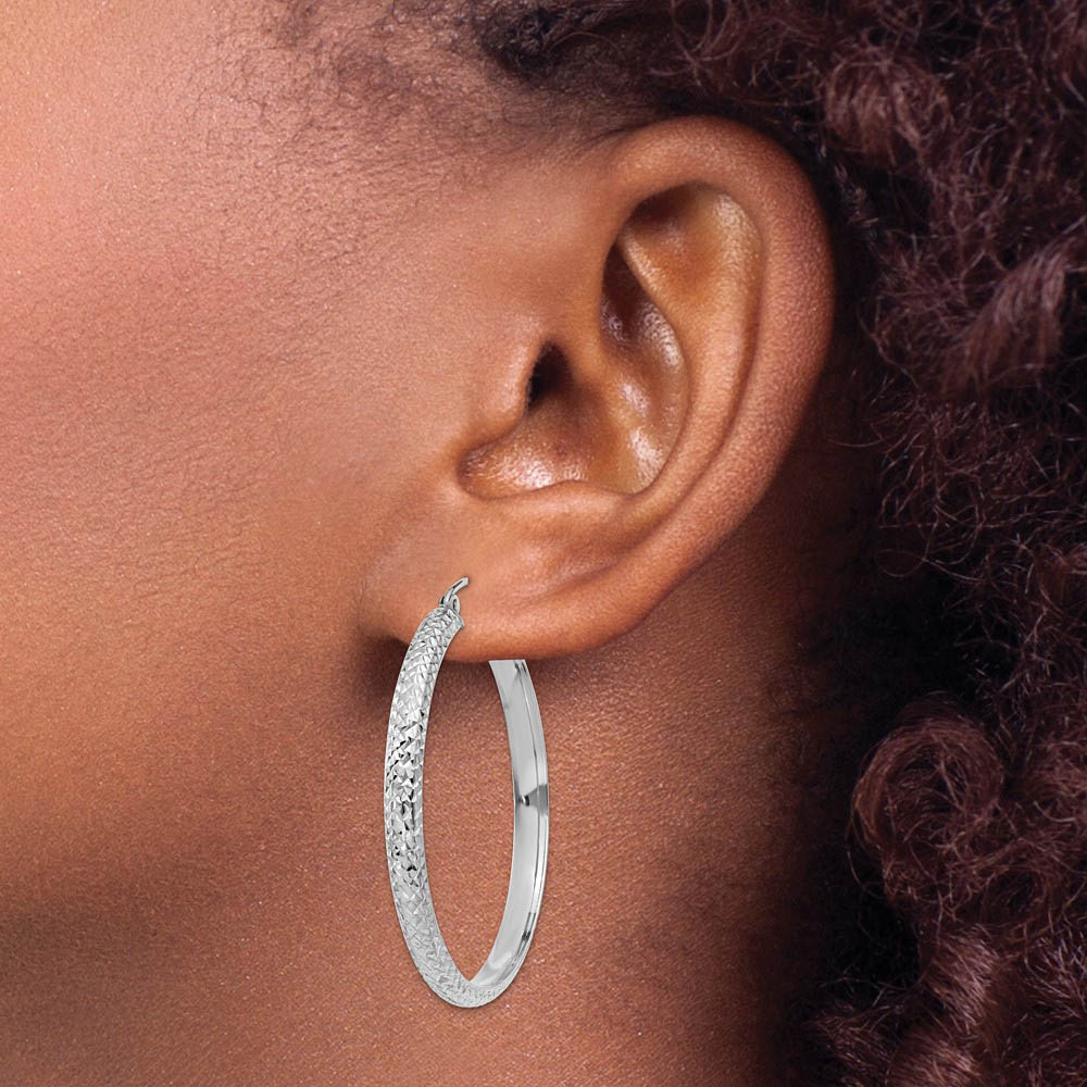Alternate view of the 3.5mm, Diamond Cut 14k White Gold Round Hoop Earrings, 38mm (1 1/2 In) by The Black Bow Jewelry Co.