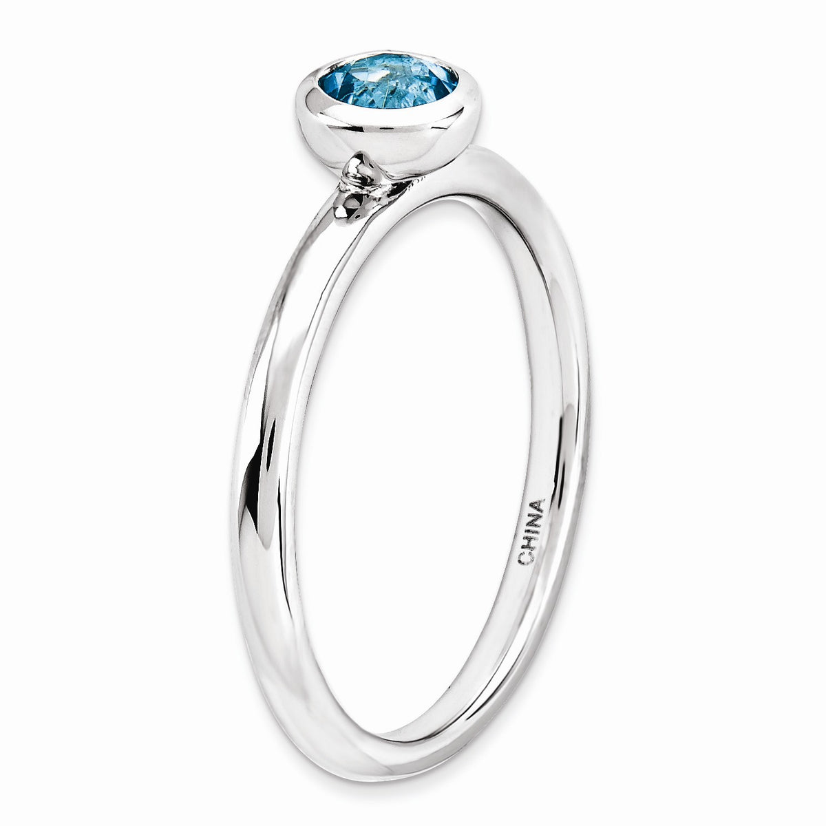 Alternate view of the Stackable Low Profile 5mm Blue Topaz Silver Ring, Size 5 by The Black Bow Jewelry Co.