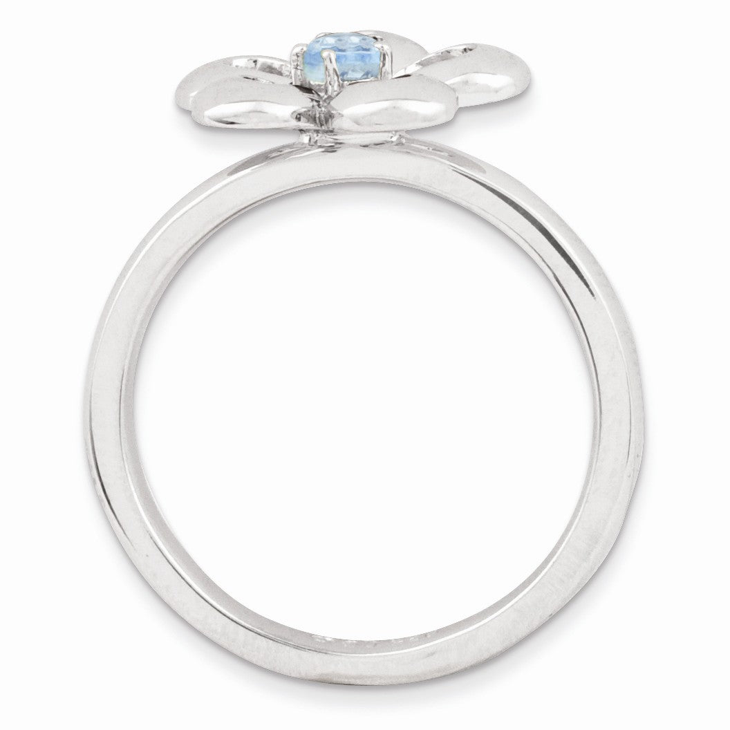Alternate view of the Silver Stackable 13mm 1/10 Carat Blue Topaz Flower Ring by The Black Bow Jewelry Co.