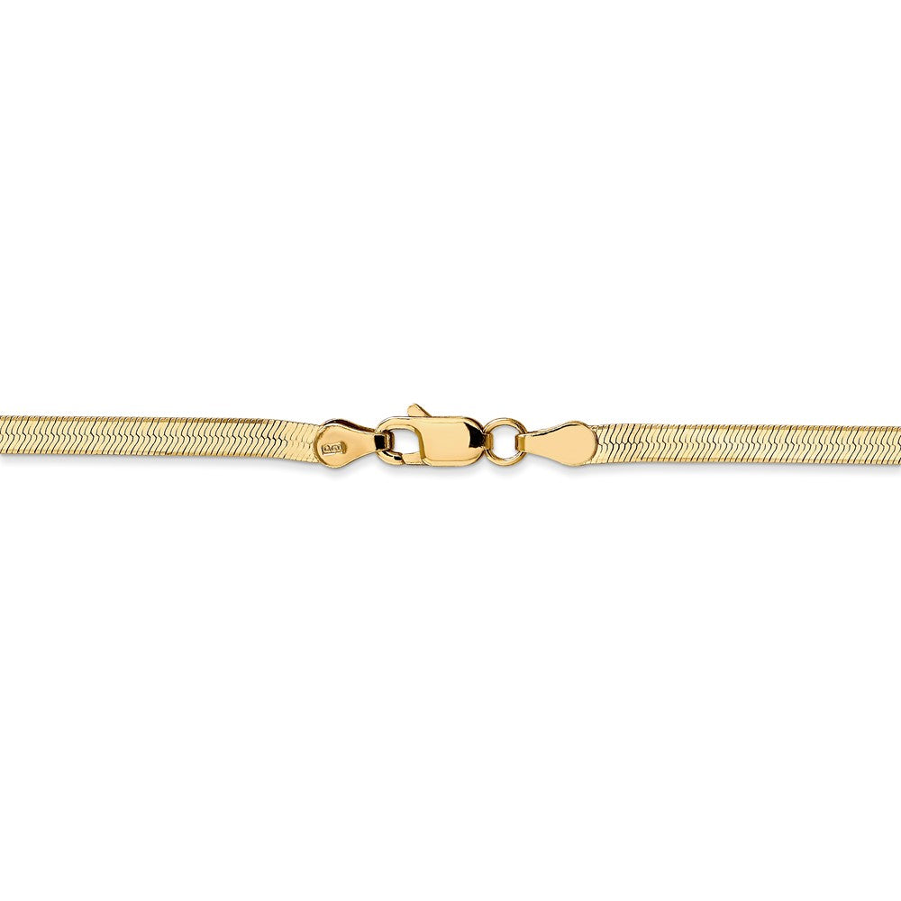 Alternate view of the 3mm, 14k Yellow Gold, Solid Herringbone Chain Bracelet by The Black Bow Jewelry Co.
