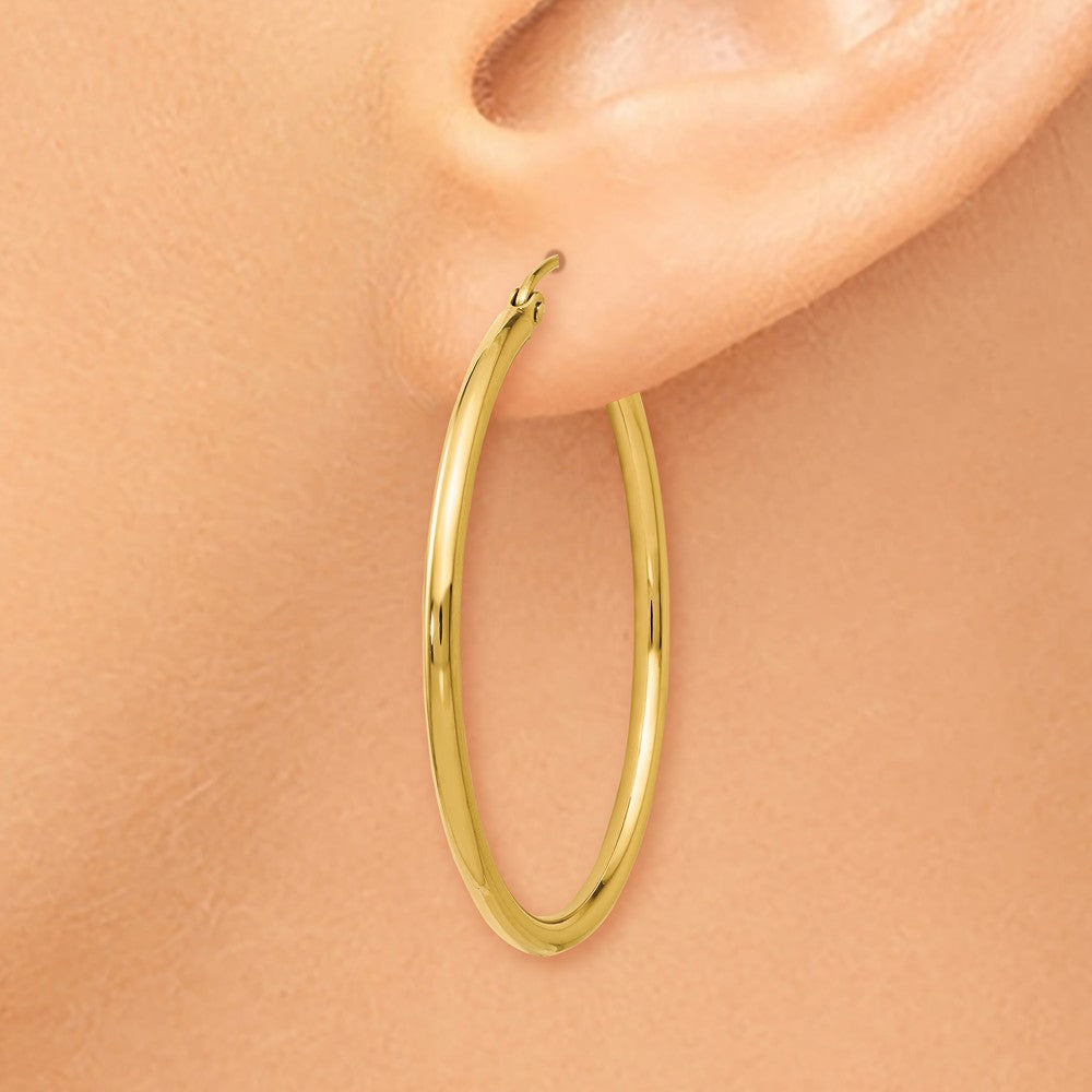 Alternate view of the 2mm Round Hoop Earrings in 14k Yellow Gold, 35mm (1 3/8 Inch) by The Black Bow Jewelry Co.