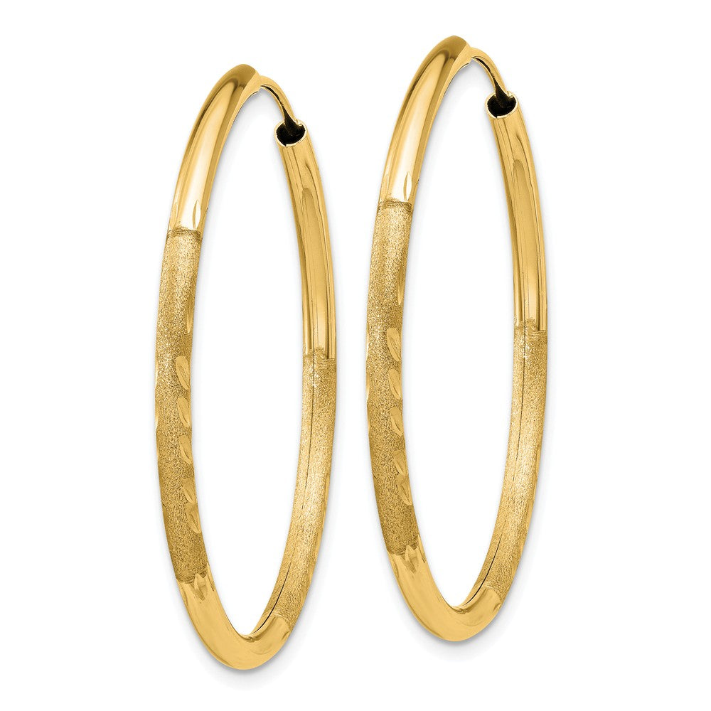 Alternate view of the 2mm x 34mm 14k Yellow Gold Satin Diamond-Cut Endless Hoop Earrings by The Black Bow Jewelry Co.