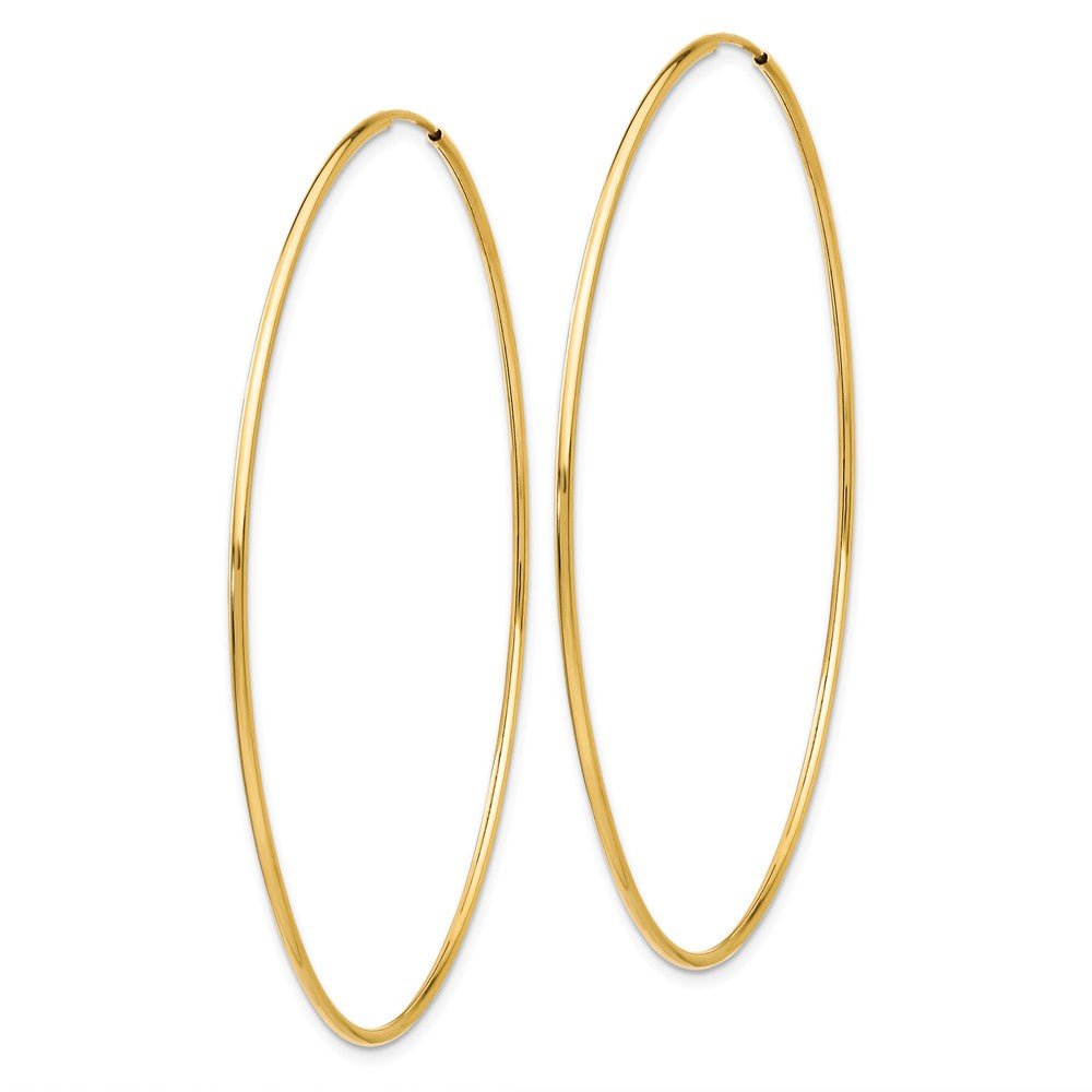 Alternate view of the 1.2mm x 67mm 14k Yellow Gold Polished Endless Tube Hoop Earrings by The Black Bow Jewelry Co.