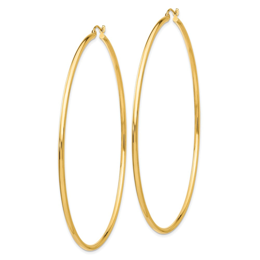 Alternate view of the 2mm x 75mm 14k Yellow Gold Polished Tube Round Hoop Earrings by The Black Bow Jewelry Co.