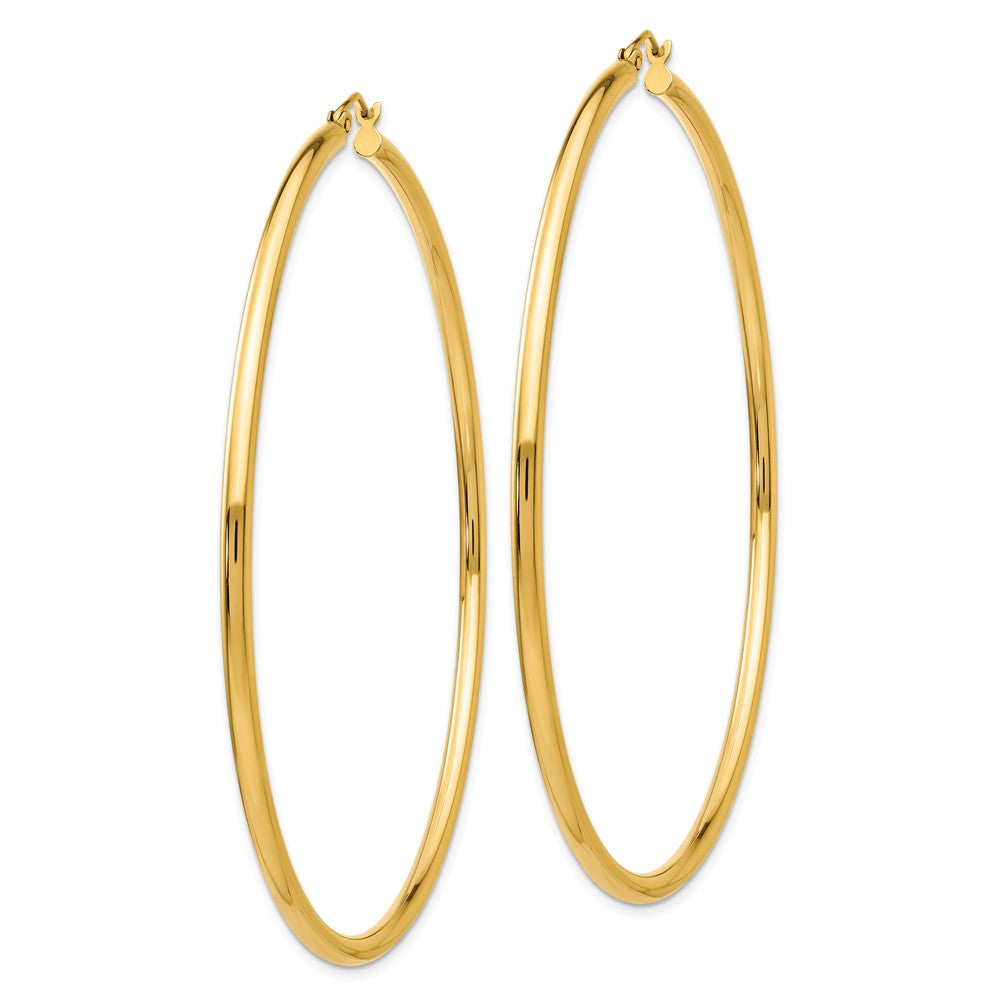 Alternate view of the 2.25mm x 70mm 14k Yellow Gold Polished Round Hoop Earrings by The Black Bow Jewelry Co.