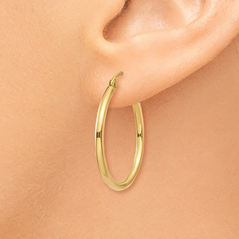 Alternate view of the 2mm x 25mm 14k Yellow Gold Classic Round Hoop Earrings by The Black Bow Jewelry Co.