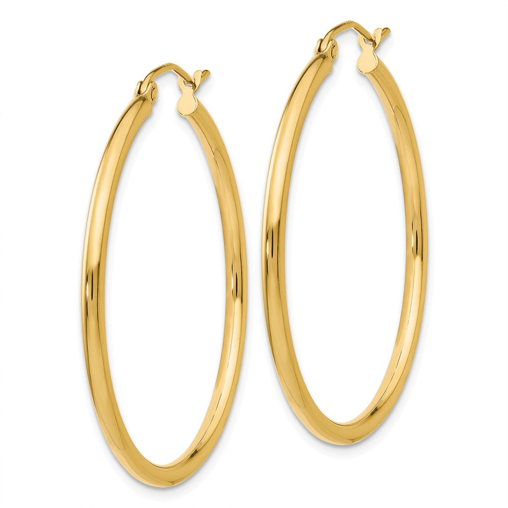 Alternate view of the 2mm x 35mm 14k Yellow Gold Classic Round Hoop Earrings by The Black Bow Jewelry Co.