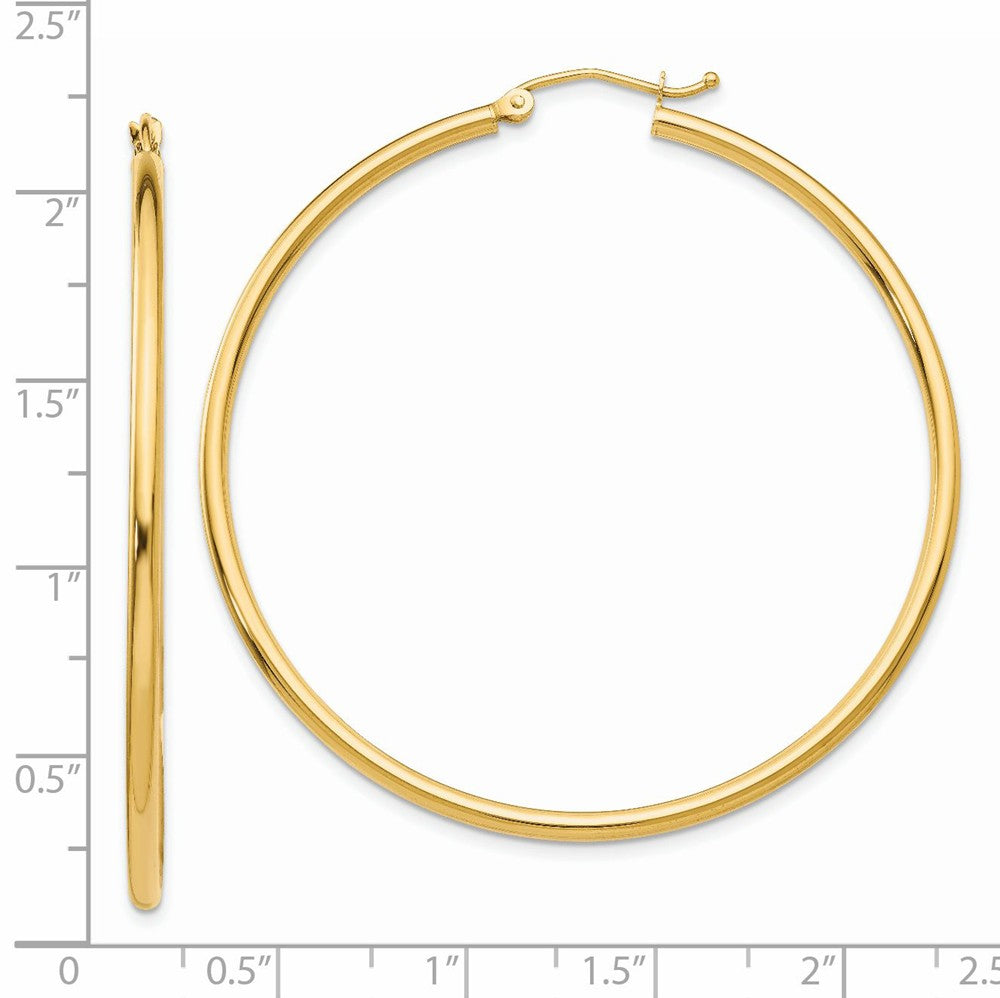 Alternate view of the 2mm x 50mm 14k Yellow Gold Classic Round Hoop Earrings by The Black Bow Jewelry Co.