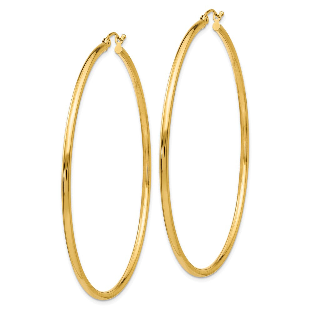 Alternate view of the 2mm x 60mm 14k Yellow Gold Classic Round Hoop Earrings by The Black Bow Jewelry Co.