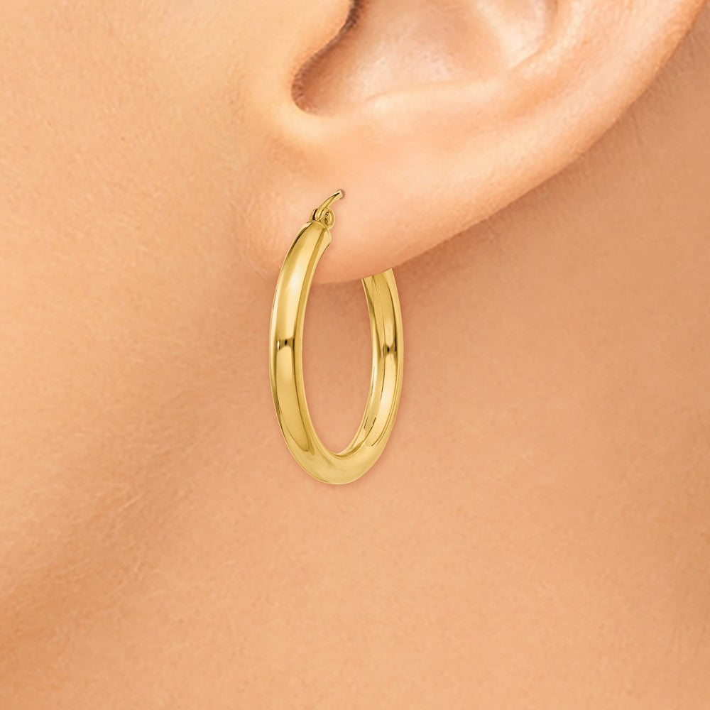 Alternate view of the 3mm x 25mm 14k Yellow Gold Classic Round Hoop Earrings by The Black Bow Jewelry Co.