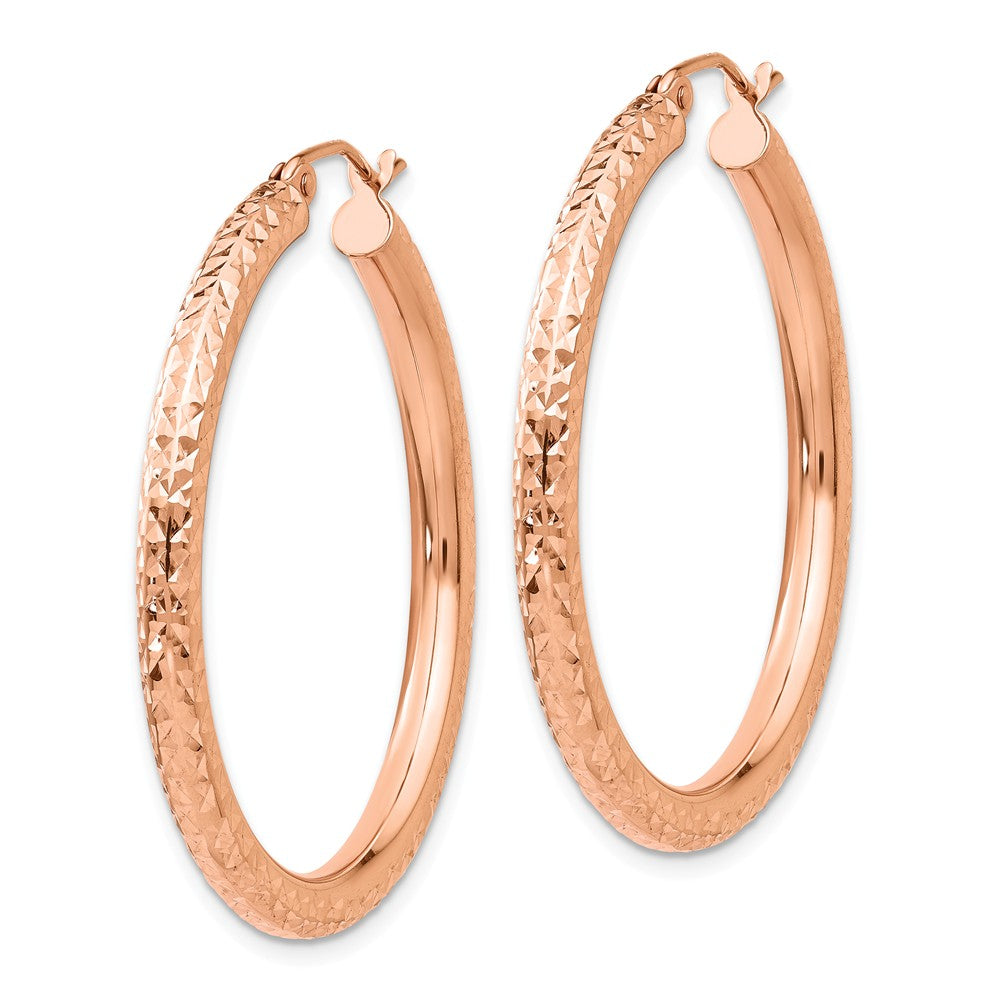 Alternate view of the 3mm x 35mm 14k Rose Gold Large Diamond-Cut Round Hoop Earrings by The Black Bow Jewelry Co.