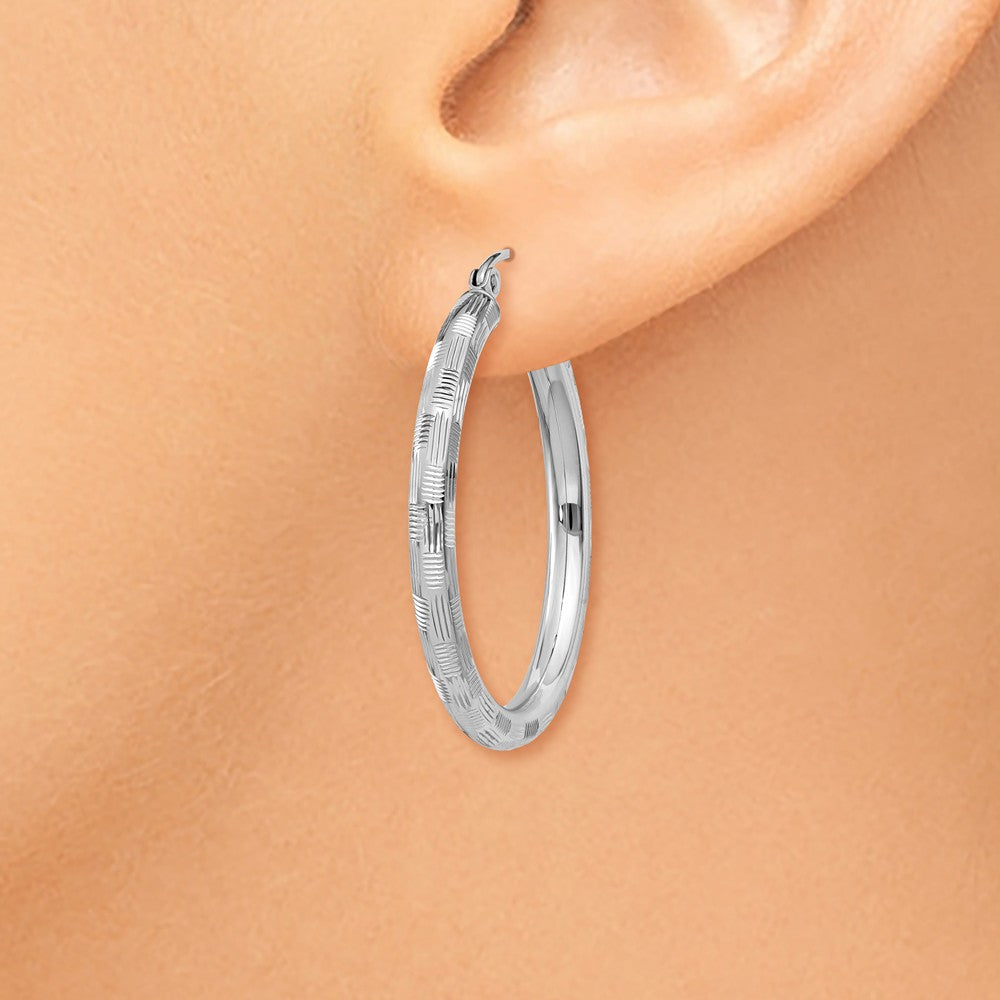 Alternate view of the 3mm x 30mm 14k White Gold Textured Round Hoop Earrings by The Black Bow Jewelry Co.