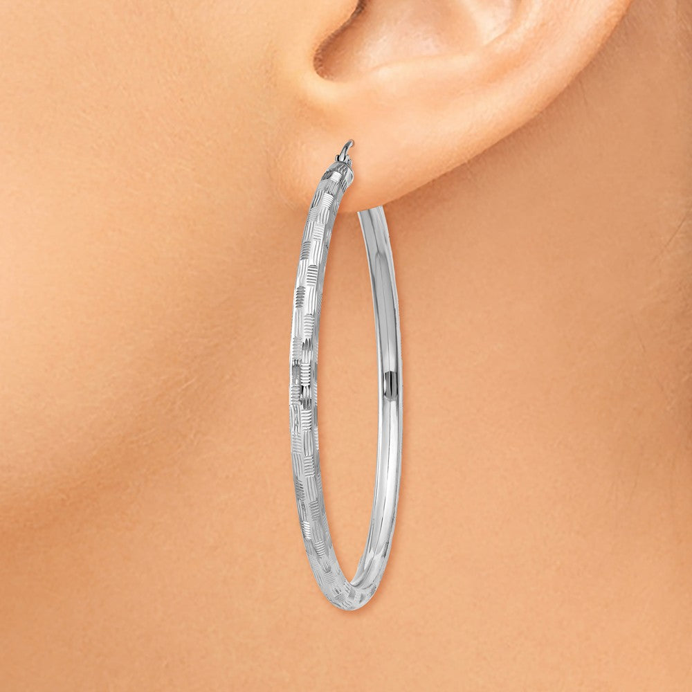 Alternate view of the 3mm x 50mm 14k White Gold Textured Round Hoop Earrings by The Black Bow Jewelry Co.