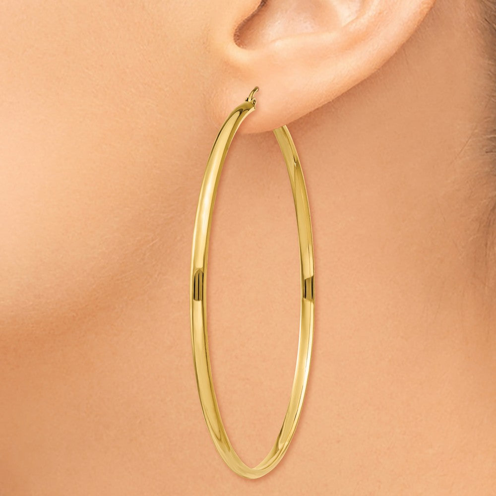 Alternate view of the 2.75mm x 65mm Polished 14k Yellow Gold Domed Round Hoop Earrings by The Black Bow Jewelry Co.