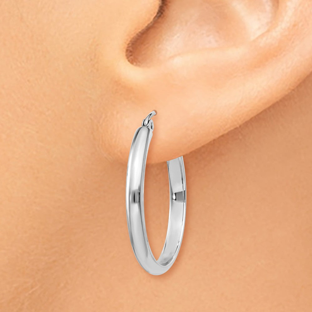 Alternate view of the 2.75mm x 25mm Polished 14k White Gold Domed Round Hoop Earrings by The Black Bow Jewelry Co.