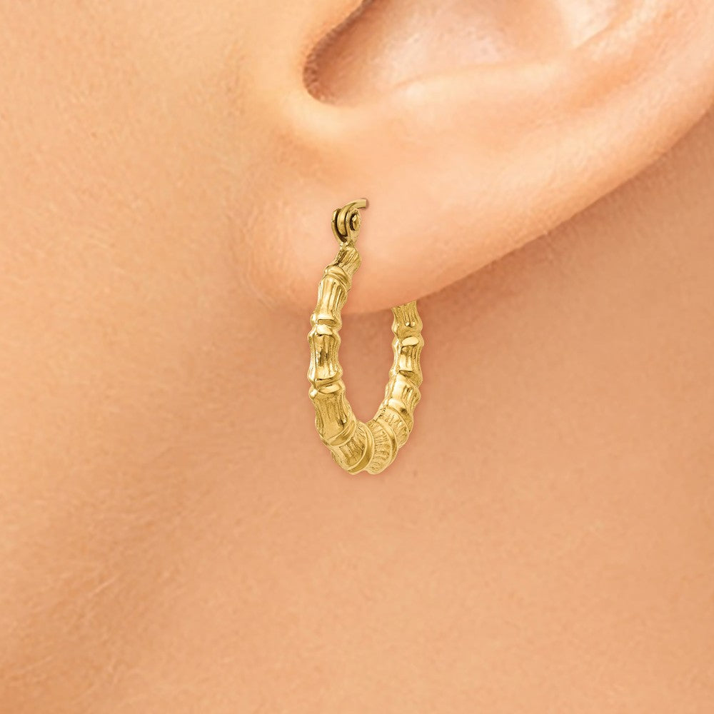 Alternate view of the 3mm x 18mm 14k Yellow Gold Hollow Bamboo Inspired Hoop Earrings by The Black Bow Jewelry Co.