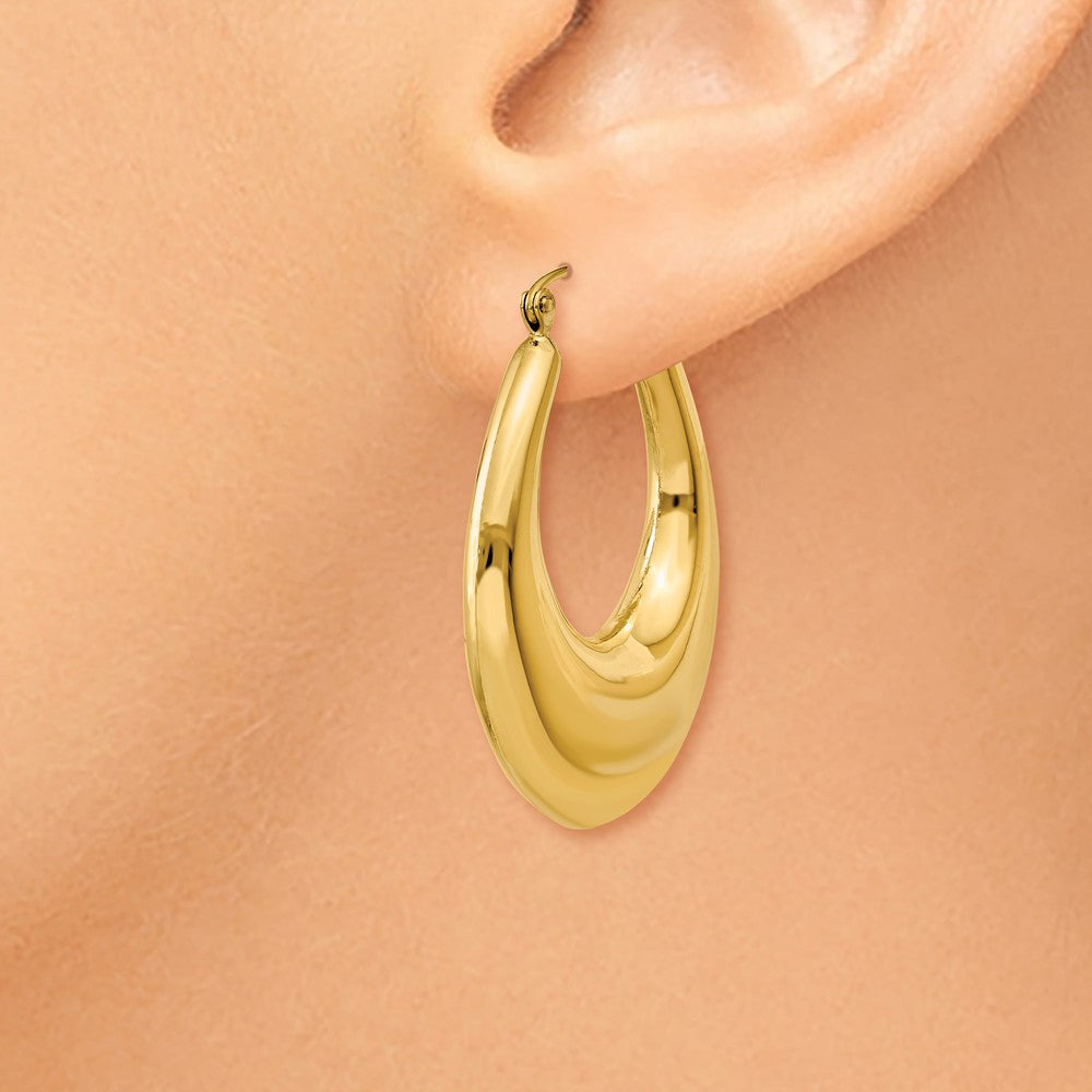 Alternate view of the 6mm x 33mm Polished 14k Yellow Gold Tapered Puffed Oval Hoop Earrings by The Black Bow Jewelry Co.
