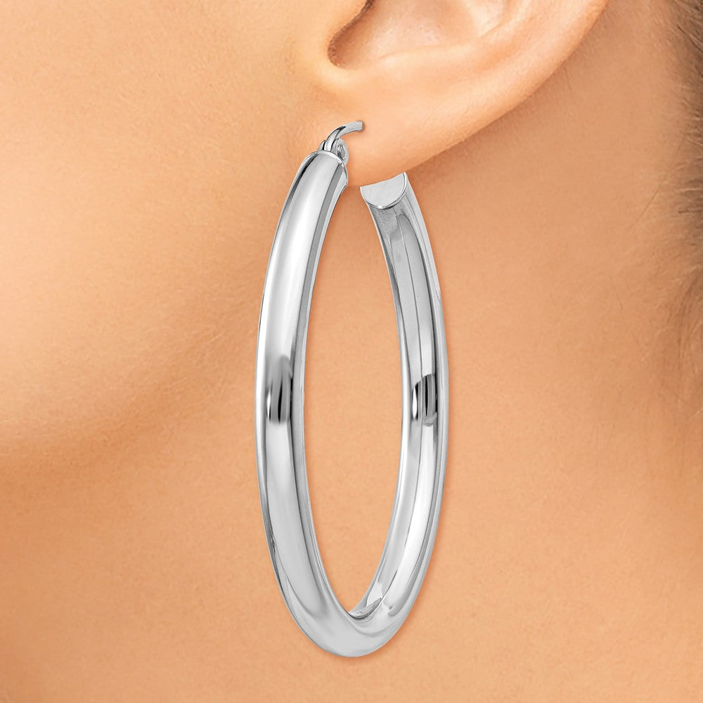 Alternate view of the 3.5mm x 38mm Polished 14k White Gold Classic Oval Tube Hoop Earrings by The Black Bow Jewelry Co.