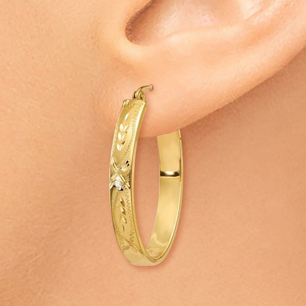 Alternate view of the 4mm x 30mm 14k Yellow Gold Satin &amp; Diamond-Cut Oval Hoop Earrings by The Black Bow Jewelry Co.