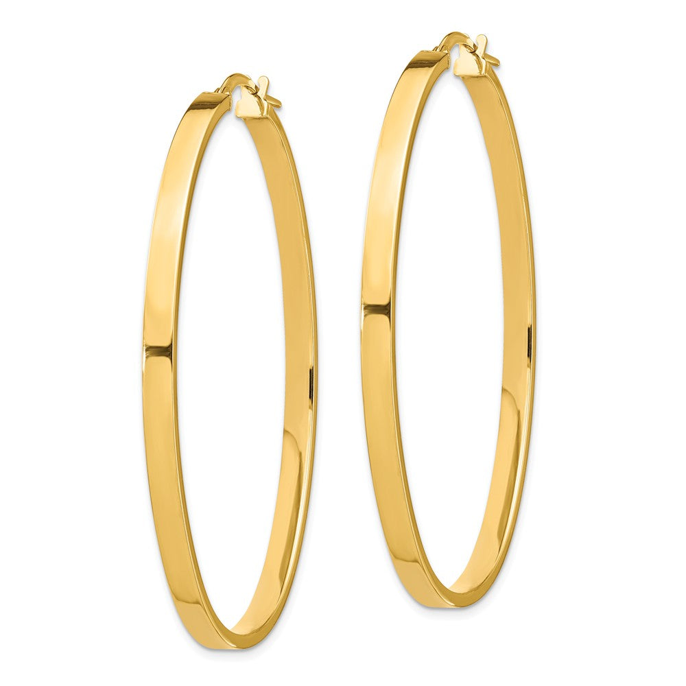 Alternate view of the 3mm x 54mm 14k Yellow Gold Polished Flat Tube Large Oval Hoop Earrings by The Black Bow Jewelry Co.