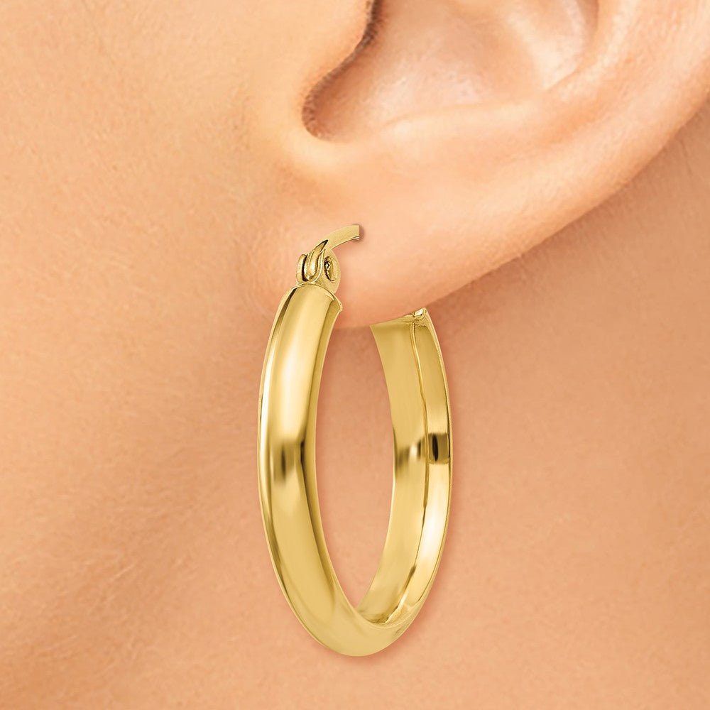 Alternate view of the 2.75mm x 19mm Polished 14k Yellow Gold Domed Round Tube Hoop Earrings by The Black Bow Jewelry Co.