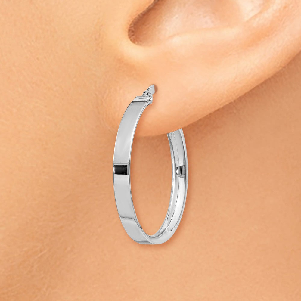 Alternate view of the 3mm x 22mm White Rhodium Plated 14k Yellow Gold Round Hoop Earrings by The Black Bow Jewelry Co.