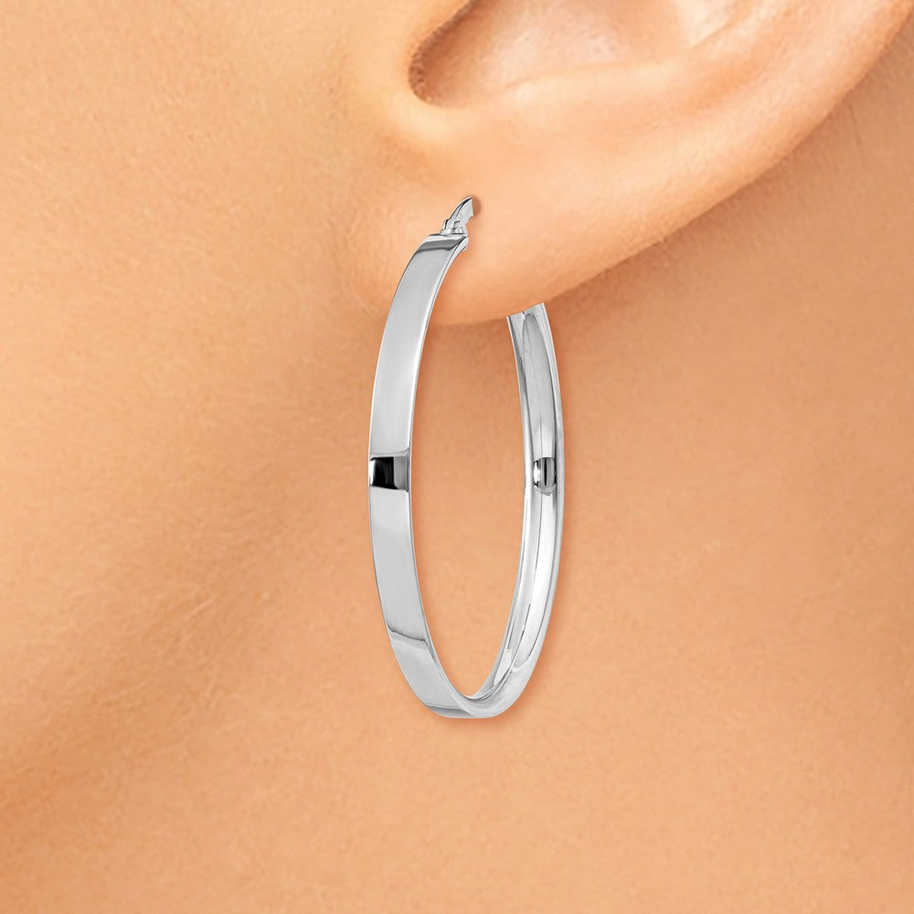 Alternate view of the 3mm x 35mm White Rhodium Plated 14k Yellow Gold Round Hoop Earrings by The Black Bow Jewelry Co.