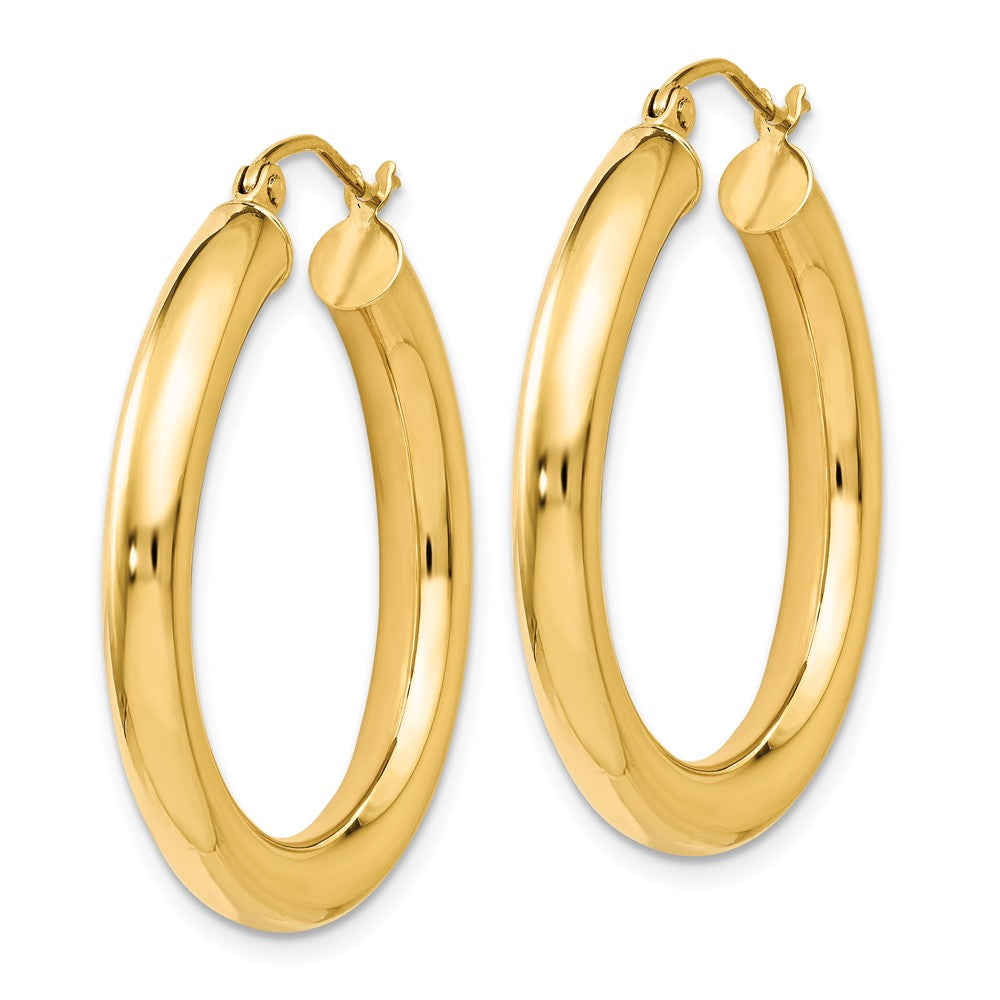 Alternate view of the 4mm x 29mm (1 1/8 Inch) 14k Yellow Gold Classic Round Hoop Earrings by The Black Bow Jewelry Co.