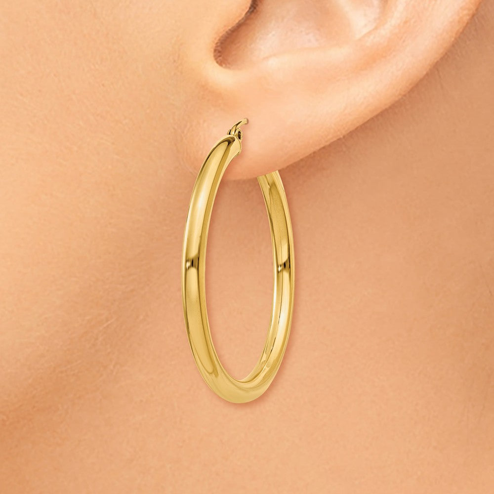Alternate view of the 3mm, 14k Yellow Gold Classic Round Hoop Earrings, 35mm (1 3/8 Inch) by The Black Bow Jewelry Co.