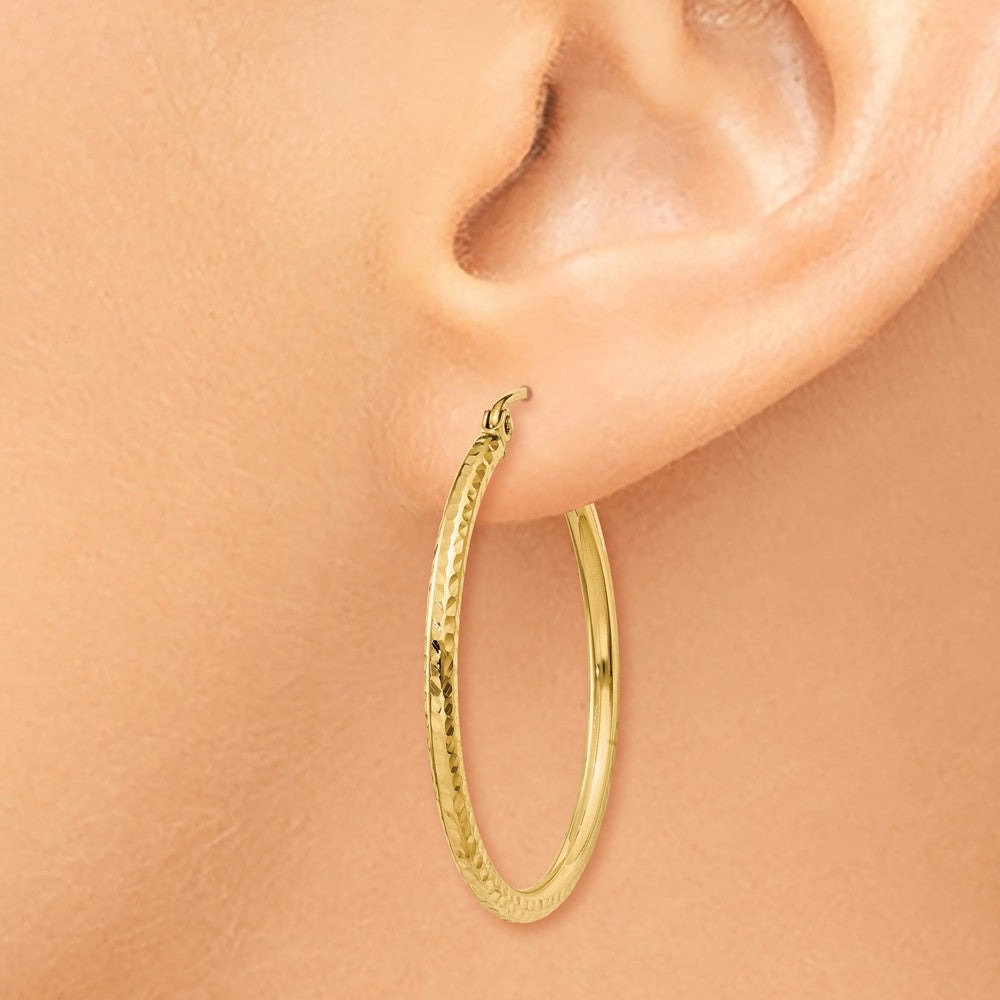 Alternate view of the 2mm, 14k Yellow Gold Diamond-cut Hoops, 30mm (1 1/8 Inch) by The Black Bow Jewelry Co.