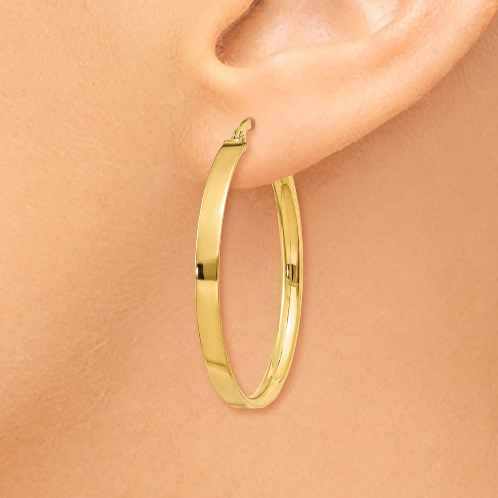 Alternate view of the 3mm, 14k Yellow Gold Polished Round Hoop Earrings, 35mm (1 3/8 Inch) by The Black Bow Jewelry Co.
