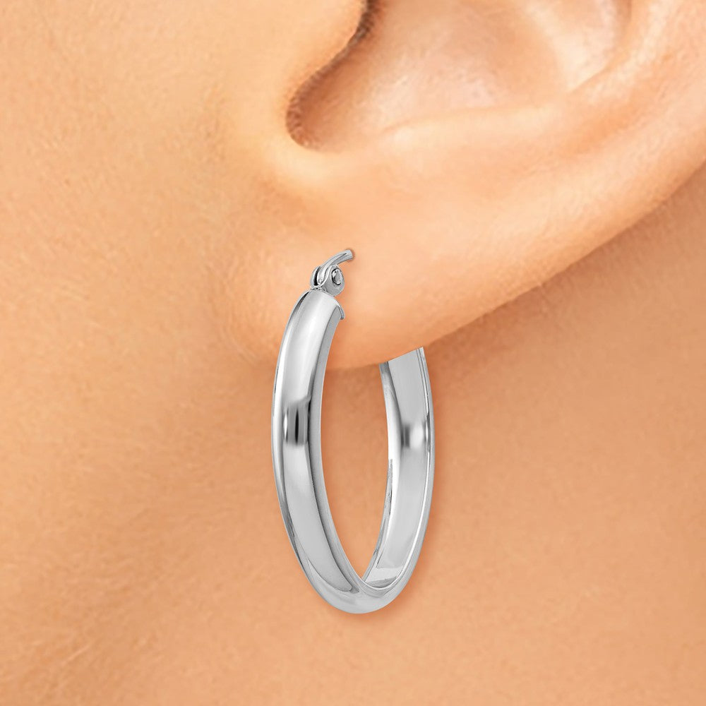 Alternate view of the 3.5mm, 14k White Gold Oval Hoop Earrings, 25mm (1 Inch) by The Black Bow Jewelry Co.