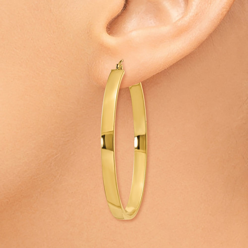 Alternate view of the 4mm, 14k Yellow Gold Large Oval Hoop Earrings, 45mm (1 3/4 Inch) by The Black Bow Jewelry Co.