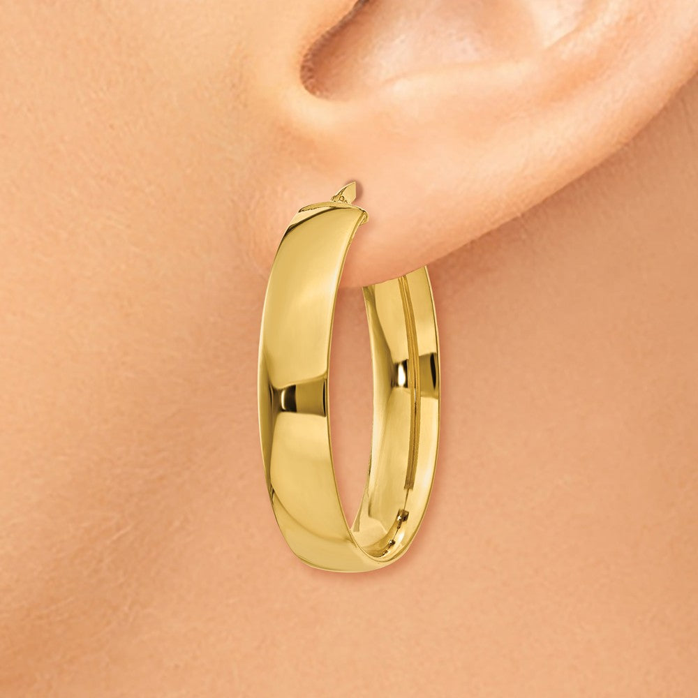 Alternate view of the 5.75mm, 14k Yellow Gold Oval Hoop Earrings, 30mm (1 1/8 Inch) by The Black Bow Jewelry Co.