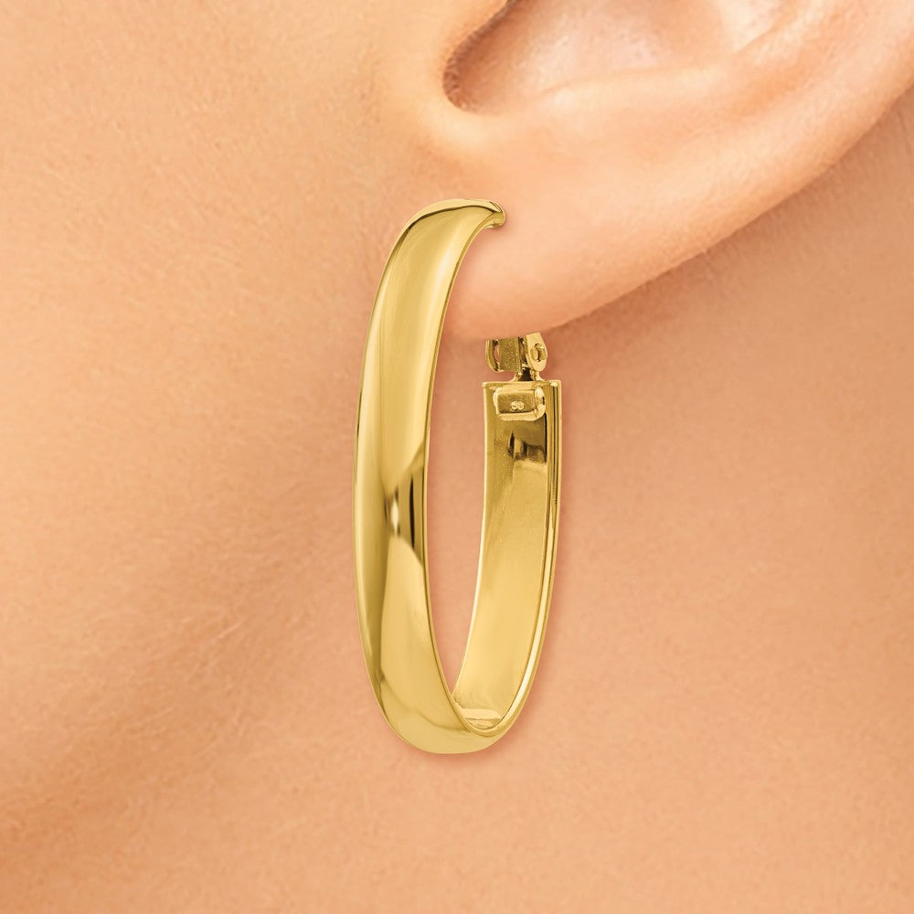 Alternate view of the 5.75mm, 14k Gold Omega Back Oval Hoop Earrings, 35mm (1 3/8 Inch) by The Black Bow Jewelry Co.