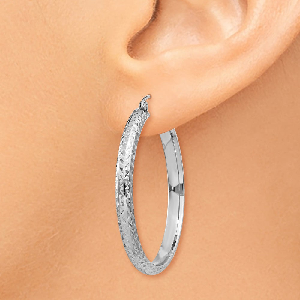Alternate view of the 3.5mm, Diamond Cut 14k White Gold Round Hoop Earrings, 34mm by The Black Bow Jewelry Co.